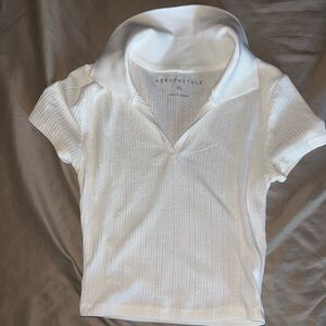 Selling a collared white tee!